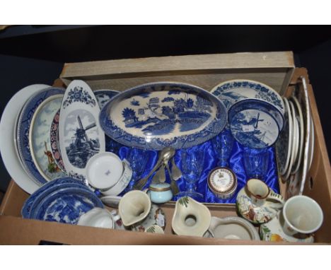 A boxed set of five crystal spirit glasses, an assortment of blue and white plates and dishes, a small Buckingham Palace trin