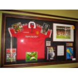 Manchester United treble winners, 1999 shirt and display, 72-1/2in w x 43-1/2in hgt