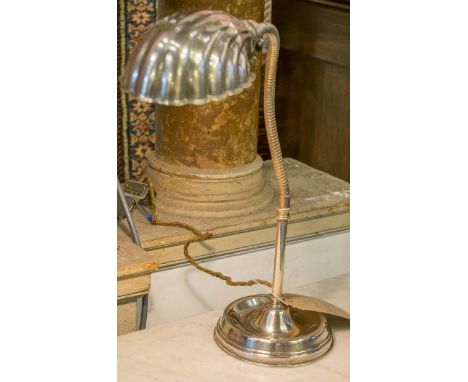 ADJUSTABLE DESK LAMP, early 20th century Art Deco silvered metal with flexible column and shell shade, approx 45cm H.