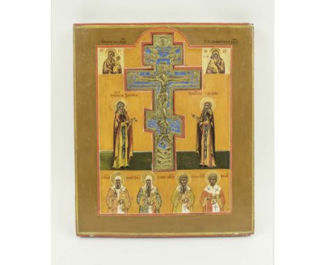 ICON OF THE CRUCIFIXION, mounted with a brass and enamel cross, with saintly figures, painted on wooden pane, 31.5cm x 26.5cm