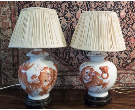 LAMPS, a pair, Chinoiserie ceramic terracotta dragon pattern and wooden bases, 52cm H. (2)