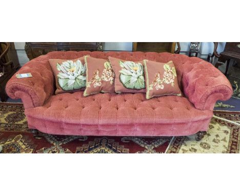 CHESTERFIELD SOFA, Victorian walnut in salmon pink chenille with buttoned back with four embroided cushions, 210cm W x 73cm H