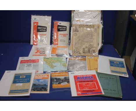 A COLLECTION OF 10 ORDNANCE SURVEY MAPS/ STREET PLANS, together with a collection of larger maps to include the travels of Ge