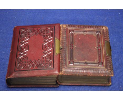 TWO LEATHER BOUND VICTORIAN ALBUMS CONTAINING CARTES DE VISITES, to include Price and Sons, R Deacon, Hazard etc