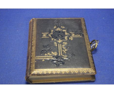 AN ALBUM OF VICTORIAN PORTRAIT PHOTOGRAPHS, CARTE DE VISITES, to include examples by R. Jones Leominster