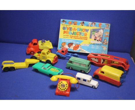 A BOXED VINTAGE CHAD VALLEY BATTERY OPERATED GIVE A SHOW PROJECTOR AND SLIDES, together with a tray of plastic toys