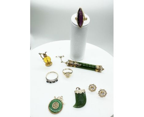 A mixed lot of 9ct yellow gold, some hallmarked and some not, Jade brooch not hallmarked, 7cm x 1cm, tigers tooth jade pendan