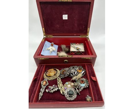 A nice red leather vintage jewellery box, contains a mix of Scottish design jewellery
