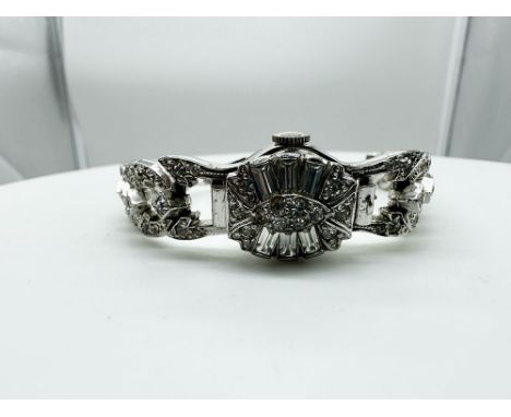 A vintage mechanical chalet 17 cocktail style watch, it has cubic zirconia marques style bracelet, base metal, in working ord