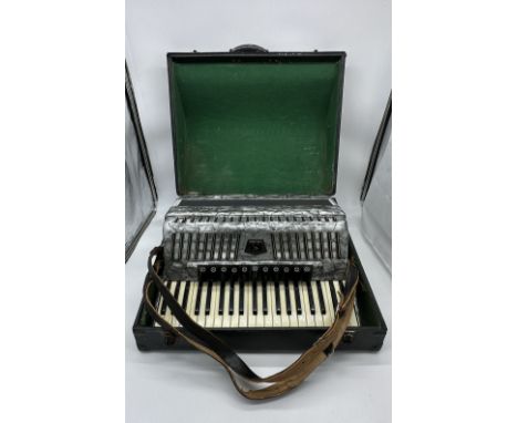 A Bailey 120 bass accordion, 11 trebles, old in used condition but great, the handle of the carry case is broken at one side,