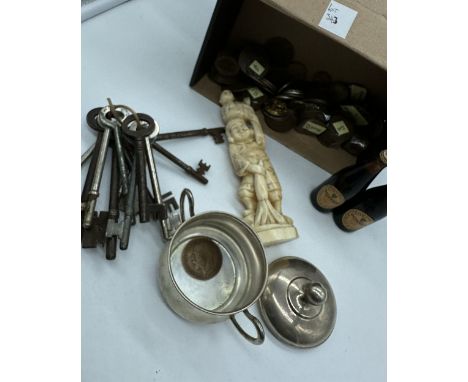 A mixed lot, a carved japanese figurine, vintage keys, mini bottles of guiness, collection of coins