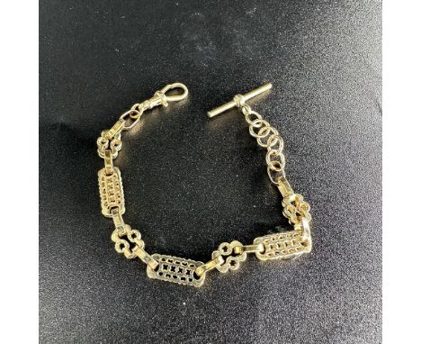 A 9ct yellow gold fancy link bracelet with T-bar and lobster trigger, approx weight 18.3 grmas, 8+1/2 inches long, Links are 