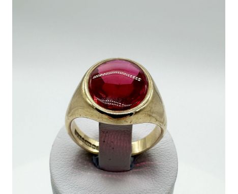 A 9ct yellow gold garnet signet ring, size Q, approx weight 6.8 grams