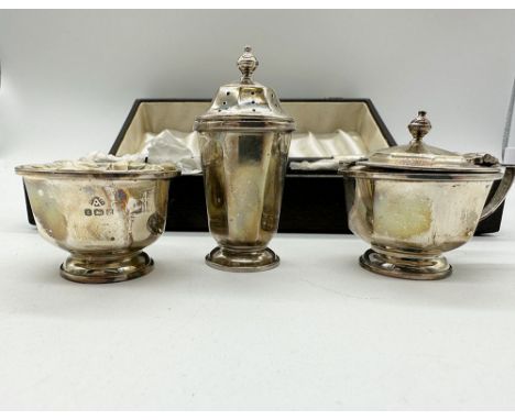 A silver vintage condiment dishes, comes in the original box