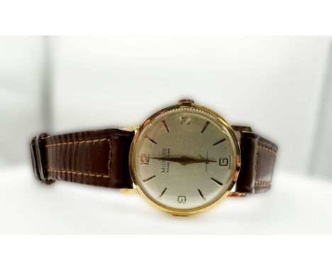 An 18ct yellow gold Monvis, Swiss made, ancre 17 jewells, not its original strap, hallmarked, gold vintage watch, carefully o