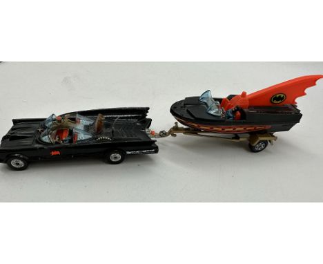 A Corgi gift set, a Bat mobile + Bat boat, vintage collectable, Robin is missing but has 2 Batman figures, played condition