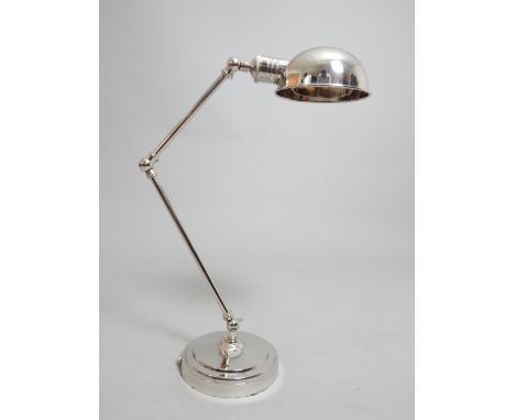Contemporary nickel plated desk lamp, domed shade, tri-hinge arm and circular base, 53cm h.
