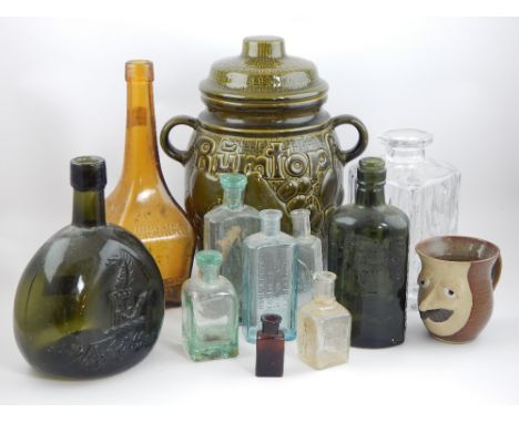 19th century W & A Gilbey green glass gin bottle, an early Gordons gin bottle, a collection of other glass bottles and jars, 