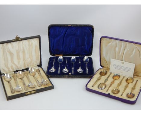 Cased set of six silver gilt spoons, modelled on the Coronation Spoon used by the Archbishop of Canterbury to annoint British