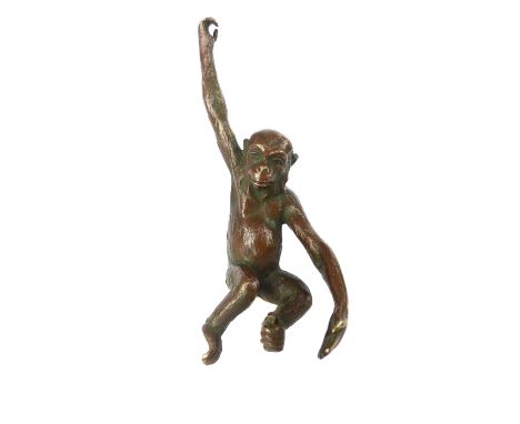 Patinated bronze monkey/chimpanzee, 20cm L approx 12cm.