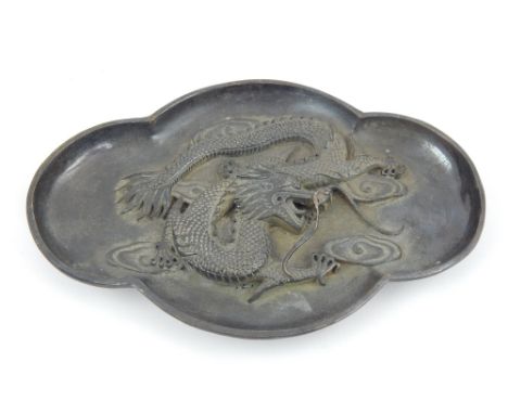 Chinese bronze tray, shaped edge, the centre with raised dragon design, 19cm l. 