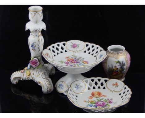 German floral encrusted porcelain candlestick, a small comport and matching dish and a Sevres style baluster vase. (4)