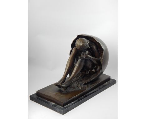 A bronze in the manner of Bruno Zach, Choesterol, woman emerging from an egg, bronze, on a rectangular black marble base, 47c