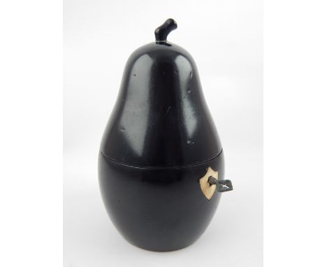 Georgian style ebonised tea caddy, modelled in the form of a pear. 