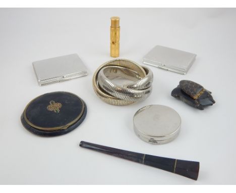 Collection of compacts, lipstick holder, cigarette holder and expanding bangle bracelet. (qty)