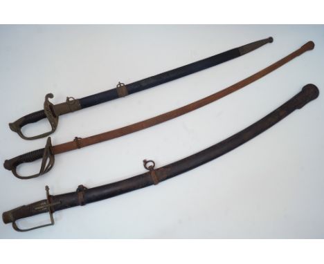 A group of three swords, each with a scabbard, to include a composite French Cavalry saber, the blade dated 'Mai 1816' and in