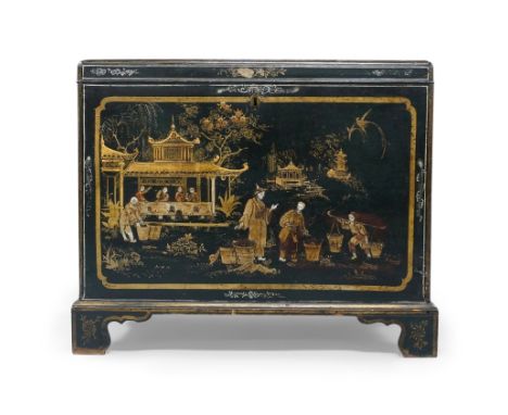 An Edwardian Japanned camphor wood trunk, with twin iron handles, raised on bracket feet, 78cm high, 92cm wide, 59cm deeppart