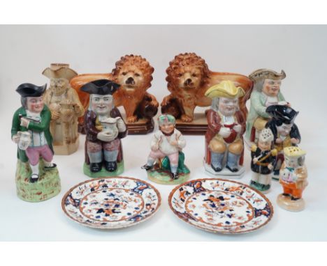 A group of Staffordshire ceramics, 19th century and later, to include a salt glazed stoneware Toby jug modelled as a seated g