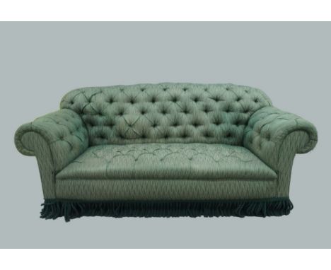 A Victorian style Chesterfield sofa, 20th century, with green button back upholstery, raised on turned mahogany feet, 82cm hi