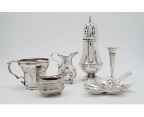 A group of silver, comprising: a sugar caster, Birmingham, 1960, Henry Clifford Davis, with flambeau finial to pierced cover,