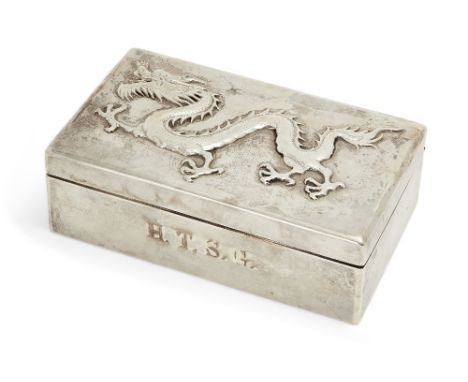 A Chinese silver cigarette box by Wang Hing, early 20th century, the cover decorated in relief with a dragon, marks to base, 