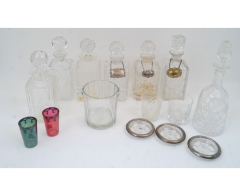 A group of cut crystal and glass decanters, 20th century, of which six are of rectangular form with decorative geometric patt
