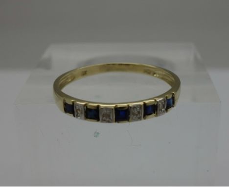 A 9ct gold, diamond and sapphire ring, weight 0.9g, size N, one loose sapphire