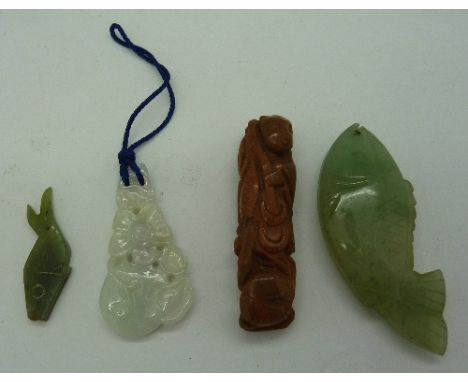 A jade pendant, two carved hardstone fish and a carved oriental figure