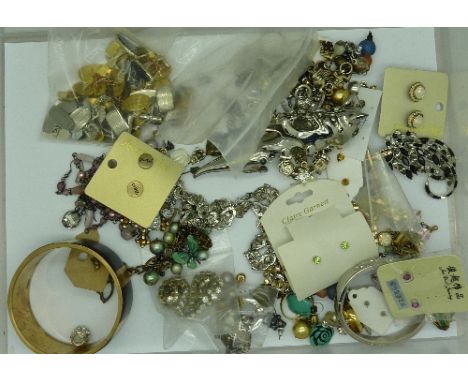 A collection of costume jewellery and cufflinks