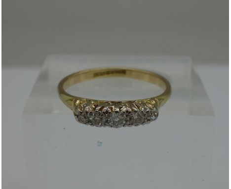 An 18ct gold and diamond five stone ring, weight 2.7g, size O