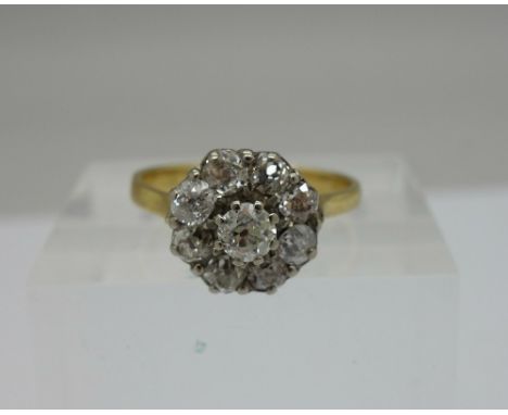A Victorian 18ct gold and platinum set old cut diamond cluster ring, approximately 1ct diamond weight, weight 3.1g, size M