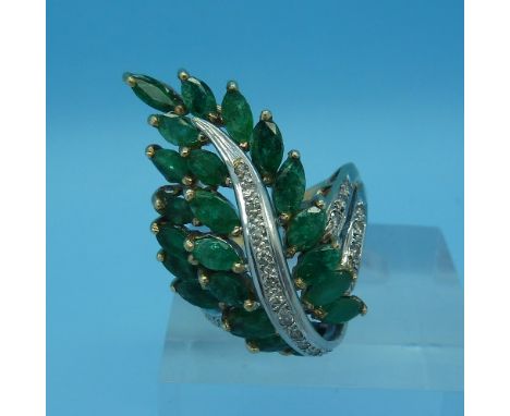 A 14ct gold, emerald and diamond cocktail ring, weight 7g, size N