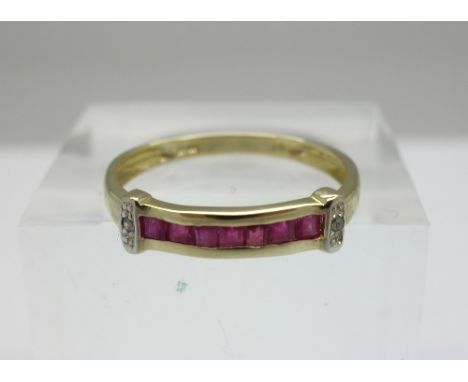 A 9ct gold, ruby and diamond ring, weight 1.3g, size O