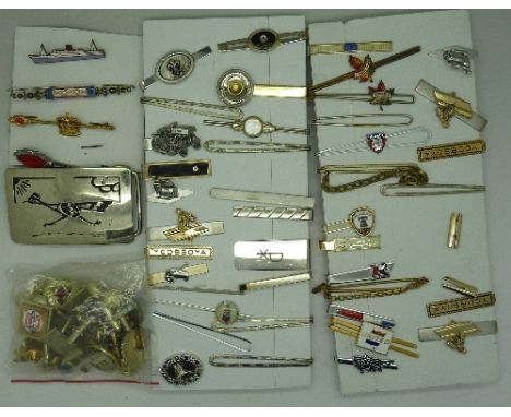 Forty-one tie clips, assorted cufflinks and a belt buckle