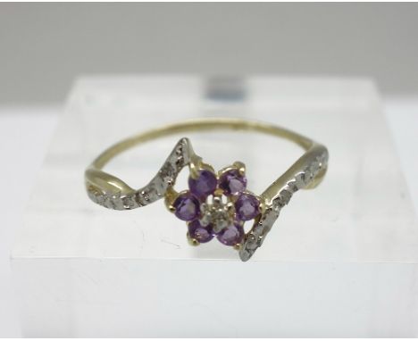 A 9ct gold, amethyst and diamond ring, weight 1.0g, size O