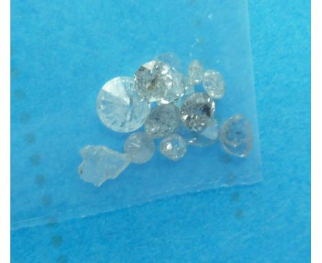 Twelve unmounted diamonds, total diamond weight over 1.10ct