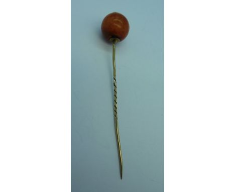 A coral stick pin