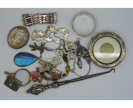 Assorted silver jewellery, including two gate bracelets, cameo brooch, stamp case, butterfly wing pendant, etc.