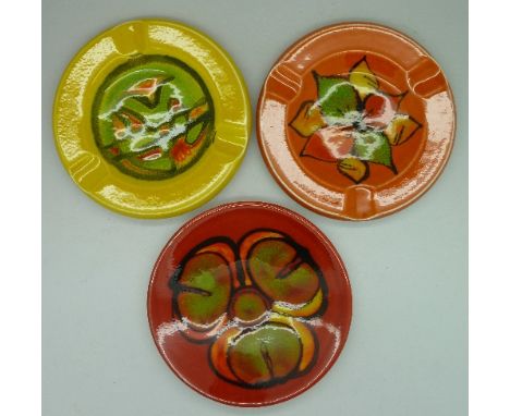 Two Poole ash trays and a pin dish