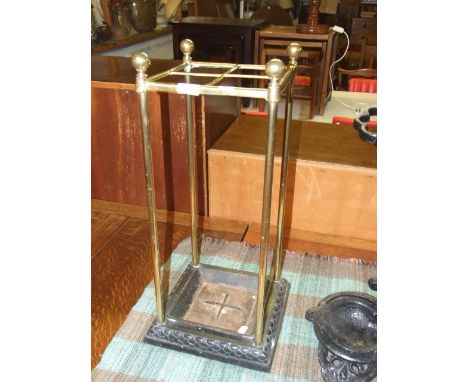 Antique Brass stick stand with cast iron base 11 x 11 inches 26 tall